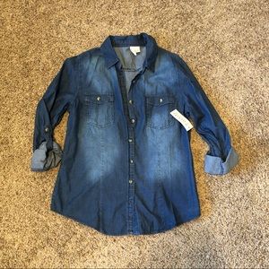 Button up shirt states Women’s size large but runs more like a small NWT.